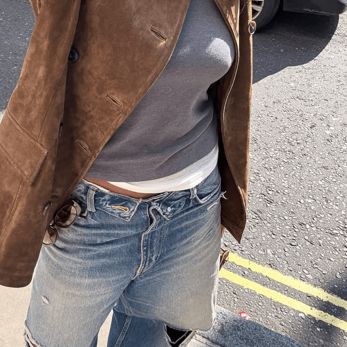  Suddenly, Everyone Cool Is Wearing Sun-Faded Jeans—Here's How to Style Them This Spring 